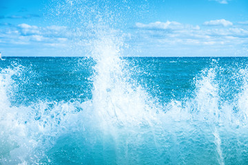 Naklejka na ściany i meble Big wave on the blue sea