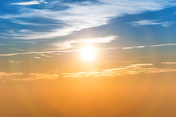Sunset in the sky with blue orange clouds