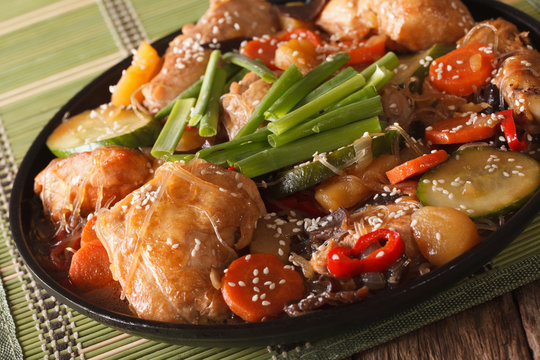 Dakjim braised chicken with vegetables in a Korean style close-up. horizontal
