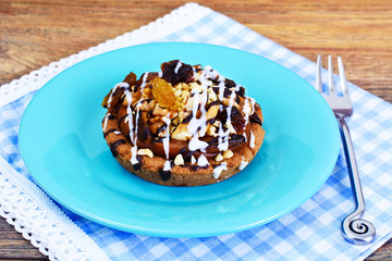 Homemade Cakes: Cake on Plate with Nuts, Chocolate and Raisins