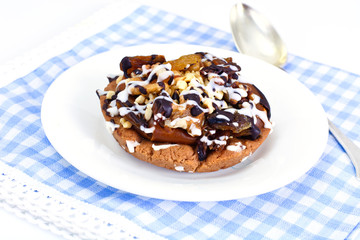 Homemade Cakes: Cake on Plate with Nuts, Chocolate and Raisins