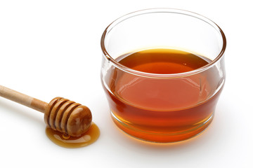 Honey and honey dipper