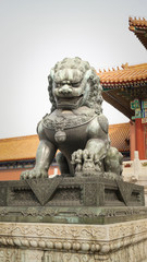 A bronze lion statue in Forbidden City