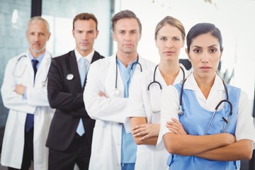 Medical team standing with arms crossed
