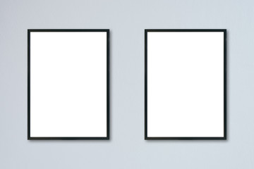 Mock up blank frame hanging on wall in room