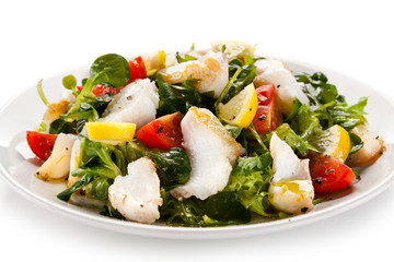Fish salad - fried cod and vegetables 