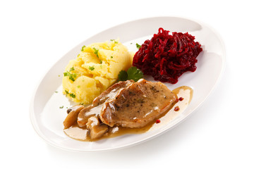 Roast steaks, boiled potatoes and vegetable salad 
