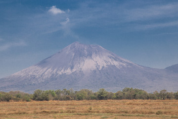 Fototapeta na wymiar telica volcano view as background on blue sky, Leon, Nicaragua, Centralamerica