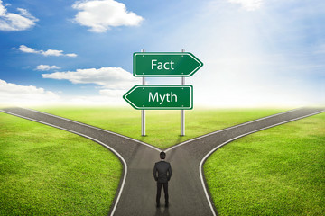 Businessman concept, Sign Fact or Myth road to the correct way.