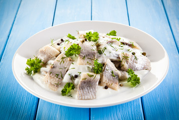 Marinated herring fillets in cream