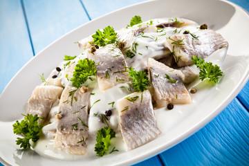 Marinated herring fillets in cream