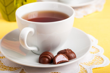 A Cup of Tea with Easter Egg Shaped Chocolate Candies