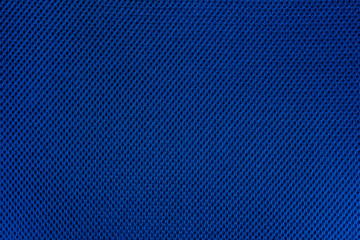 Blue fishnet cloth material as a texture background. 
