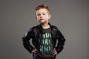 Fashionable child in leather coat.stylish little boy. spring fashion © eugenepartyzan