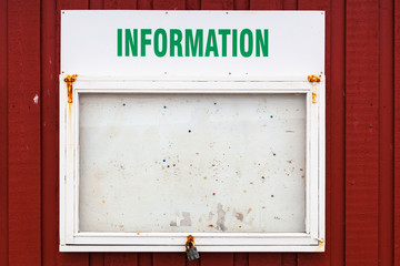 Information board for notes on a house wall
