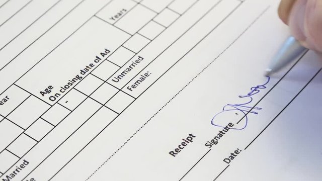 Signing Receipt Document Form. Hand signing a contract. A contract is a voluntary arrangement between two or more parties that is enforceable at law as a binding legal agreement.