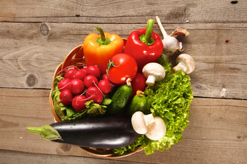 Vegetables . Fresh Bio Vegetable in a Basket. Over Nature Background