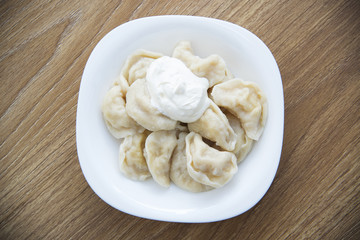 Russian national dish - dumplings with potatoes.