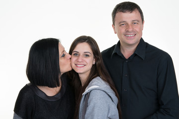 Mother, father and teen daughter portrait isolated