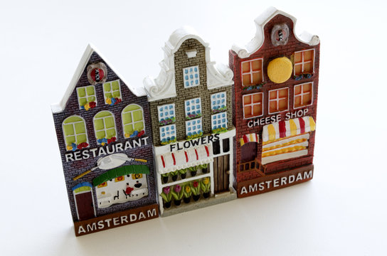 souvenirs from Holland in form of houses facades on a light background
