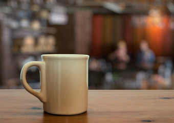 Fototapeta na wymiar mug on wooden table