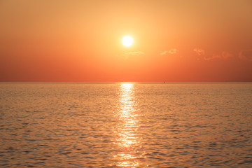 Sunset at sea ocean in beautiful winter season