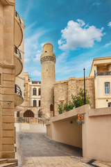 Fototapeta na wymiar Minaret of Juma Mosque, Cume mescidi in the Baku Old City, Azerbaijan