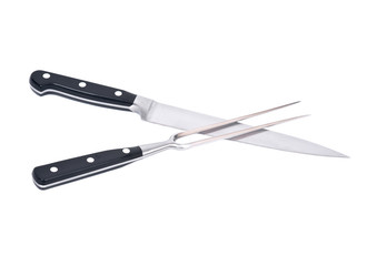 Carving knife and fork separated on white background