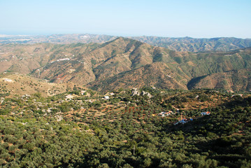 Fototapeta na wymiar View over the Montanas de Malaga mountains towards the coast, Spain.