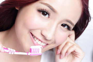 Smile woman brush teeth