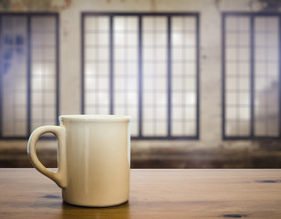 mug on old wooden table