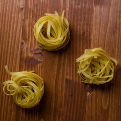 tagliatelle pasta on brown table