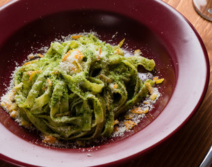 tagliatelle dish in red plate