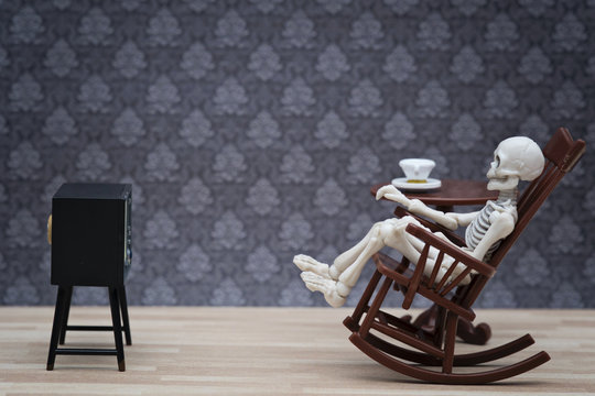 skeleton watching tv