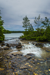 small flowing waterfalls in nature landscape