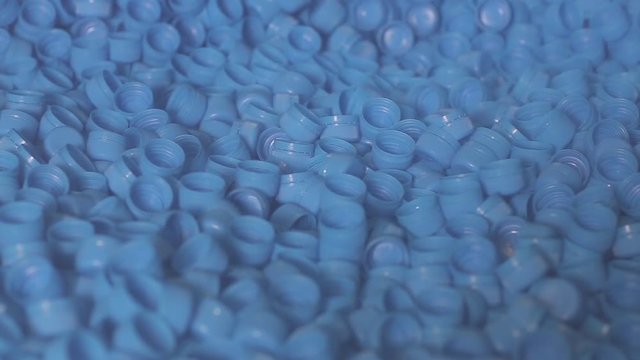 The production line of mineral water and carbonated drinks. Plastic packaging