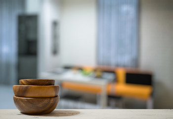 stack of empty wooden bowls on table