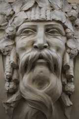 Fototapeta na wymiar Détail d'une l'entrée d'un immeuble parisien représentant une tête de gaulois