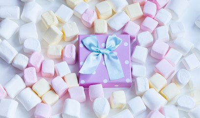 marshmallow and gift on the table