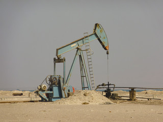 Fototapeta premium Oil Beam Pump or Nodding Donkey on the Beach in Egypt