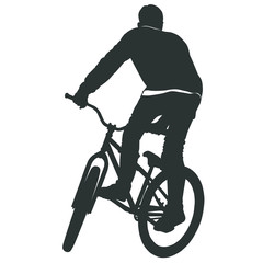 Teenager riding a BMX bicycle