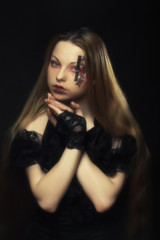 Fototapeta premium young woman with creative face-art