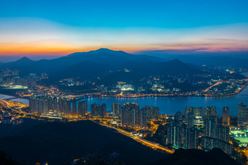 Naklejka premium Mountain landscape at sunset time in downtown of Ma on shan,Hong kong