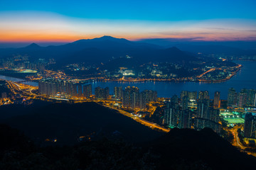 Fototapeta na wymiar Mountain landscape at sunset time in downtown of Ma on shan,Hong kong