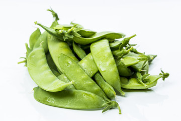 Fresh Green Sugar Snap Peas on a Bright Background
