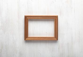 Obraz na płótnie Canvas photo frame on white wall