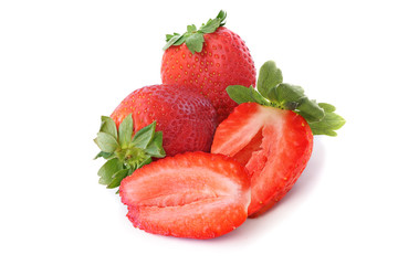 Two strawberries with slices isolated on white