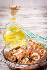 quail with spices in the marinade