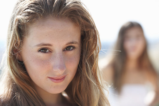 Portrait of teenage girl, focus on foreground