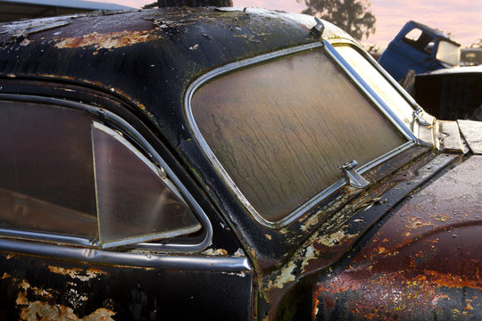 Close Up Of Vintage Car In Scrap Yard